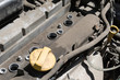 Photo: Old dirty car engine without spark plugs. Old dirty car engine without spark plugs.