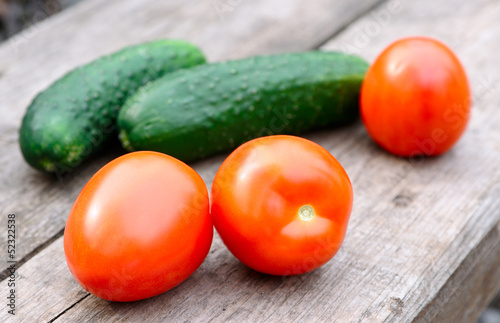 Photo: Raw tomatoes and cucumbers Raw tomatoes and cucumbers