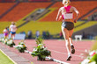 Rear view of lagging athlete