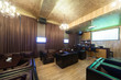 Foto: Stylish karaoke bar with armchairs and many screens. Stylish karaoke bar with armchairs and many screens.