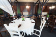 Foto: Round table in the cozy restaurant Round table in the cozy restaurant