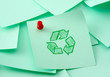 Photo: Recycle sign on green sheet of paper Recycle sign on green sheet of paper