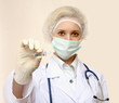 Medical doctor with syringe, isolated on white background