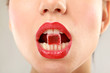 Photo: woman sucking cute sweet candy closeup woman sucking cute sweet candy closeup