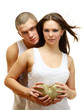 Foto: Couple Sexy holding gold heart, isolated on white background Couple Sexy holding gold heart, isolated on white background