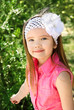 Foto: Outdoor portrait of cute little girl Outdoor portrait of cute little girl