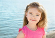 Foto: Adorable little girl on beach vacation Adorable little girl on beach vacation