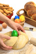 Hands kneading the Easter bread dough