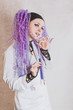 Photo: Chemist woman with test tubes Chemist woman with test tubes