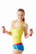 Young girl with dumbbells