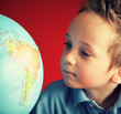 boy looking at south america