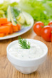 yoghurt sauce with herbs to assorted fresh vegetables