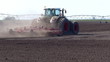 Big tractor preparing land for sowing