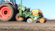 Tractor and Seeder Planting Crops