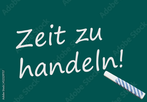 Photo: Zeit zu handeln! (deutscher Text auf Tafel) Zeit zu handeln! (deutscher Text auf Tafel)