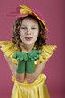 Photo: girl with flower on her head and in a yellow dress girl with flower on her head and in a yellow dress