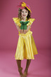 Photo: girl with flower on her head and in a yellow dress girl with flower on her head and in a yellow dress
