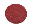 disk of brown sandpaper