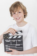 Photo: Happy Boy Smiling With Clapperboard Happy Boy Smiling With Clapperboard