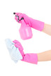 female hands in rubber gloves with spray and rag