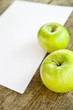 Photo: Green apples and white paper Green apples and white paper