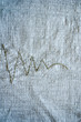 linen background embroider ornament closeup