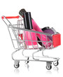 Cosmetics in cart isolated on white
