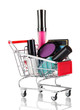 Cosmetics in cart isolated on white