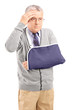 Middle aged man with a broken arm