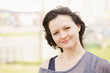 Outdoor portrait of young woman