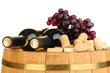 Wine and corks on barrel isolated on white