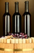 Wine and corks on barrel on brown background