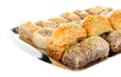 Sweet baklava on tray isolated on white