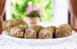 Sweet baklava on plate on table in room