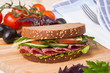 Sandwich with sausage and vegetables