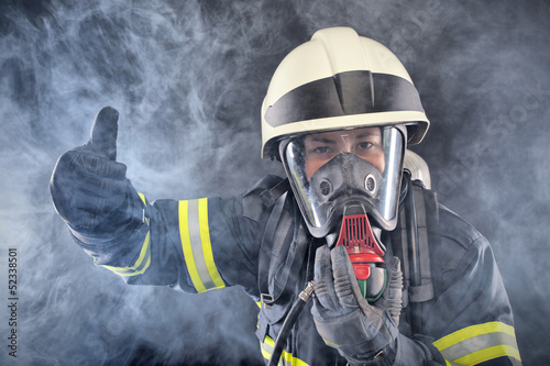 Photo: Firewoman in fire protection suit Firewoman in fire protection suit