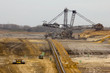 A conveyor-belt and excavator in a brown-coal mine