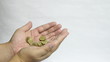 Gold coin on hand