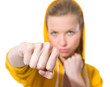 Closeup on teenager girl punching