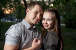 Young couple in love side view