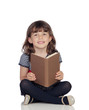 Photo: Adorable little girl with a book reading Adorable little girl with a book reading