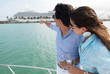 Couple pointing at a cruise