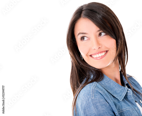 Photo: Pensive woman looking back Pensive woman looking back