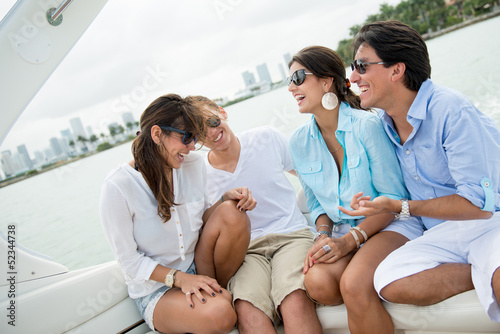 Photo: Friends having fun sailing Friends having fun sailing