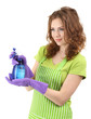 Foto: Young woman holding sprayer, isolated on white Young woman holding sprayer, isolated on white