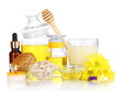 Fragrant honey spa with oils and honey isolated on white
