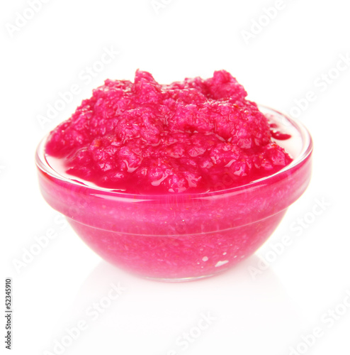 Photo: Horseradish sauce with beet in glass bowl, isolated on white Horseradish sauce with beet in glass bowl, isolated on white