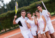 Happy group of tennis players
