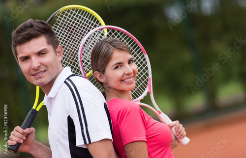 Photo: Couple of tennis players Couple of tennis players