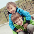 Photo: Two brothers laugh, outdoor Two brothers laugh, outdoor